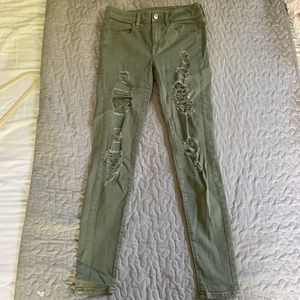 Distressed American Eagle Olive Skinny Jeans